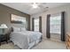 Cozy bedroom featuring neutral tones, natural light, and minimalist decor that creates a relaxing ambiance at 105 Mystic Quartz Ln, Holly Springs, NC 27540