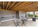 Outdoor patio area with comfortable seating, perfect for relaxing and entertaining guests at 105 Mystic Quartz Ln, Holly Springs, NC 27540