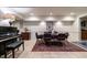 Open dining area with modern chairs, decorative rug, and warm lighting for cozy gatherings at 106 Nashua Cv, Louisburg, NC 27549