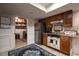Functional kitchenette with stainless steel appliances and cabinetry, ideal for a secondary living space at 106 Nashua Cv, Louisburg, NC 27549