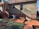 Exterior showcasing a well-maintained backyard with wooden deck, ideal for outdoor activities at 1208 Turner Farms Rd, Garner, NC 27529