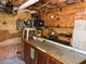 Unfinished basement featuring a workbench area and exposed utilities, ready for customization at 1208 Turner Farms Rd, Garner, NC 27529