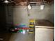 Unfinished basement space with concrete block walls, offering potential for storage or customization at 1208 Turner Farms Rd, Garner, NC 27529