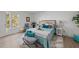 Bright bedroom featuring a cozy bed with stylish decor and natural light from a nearby window at 1208 Turner Farms Rd, Garner, NC 27529