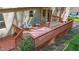 Spacious wooden deck area featuring comfortable seating and outdoor rug, perfect for relaxation at 1208 Turner Farms Rd, Garner, NC 27529
