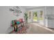 Bright dining area featuring a bench seat, colorful decor and access to the backyard at 1208 Turner Farms Rd, Garner, NC 27529