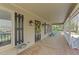 Inviting covered front porch with seating and decorative touches at 1208 Turner Farms Rd, Garner, NC 27529