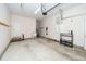 Spacious garage with utility sink, shelving, and ample space at 1222 Dixie Trl, Raleigh, NC 27607