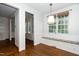 Breakfast nook with custom bench seating and large window at 1222 Dixie Trl, Raleigh, NC 27607