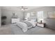 Serene main bedroom with neutral tones, comfortable bedding, and lots of natural light at 125 Vance Wrenn Rd, Roxboro, NC 27573
