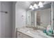 Bathroom featuring vanity with granite countertop, undermount sink and updated hardware at 1412 Wynncrest Ct, Raleigh, NC 27603