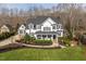 Charming two-story home with manicured lawn, well-maintained landscaping, and a welcoming front porch at 1412 Wynncrest Ct, Raleigh, NC 27603