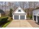 Two-car detached garage with neutral paint at 1412 Wynncrest Ct, Raleigh, NC 27603