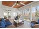 Cozy screened porch with a beautiful wood ceiling and plenty of seating, perfect for relaxation at 1412 Wynncrest Ct, Raleigh, NC 27603