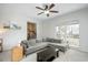 Relaxing living room with an inviting couch, lots of natural light and open floor plan at 1701 Point Owoods Ct, Raleigh, NC 27604