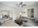 Comfortable living area with natural light and an open doorway to the dining area at 1701 Point Owoods Ct, Raleigh, NC 27604