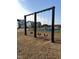 Outdoor playground with swings and other playground equipment adds value to the community at 184 Bruce Dr, Dunn, NC 28334