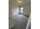 Bedroom with neutral carpet and one window allowing natural light at 184 Bruce Dr, Dunn, NC 28334