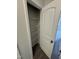 Walk-in closet equipped with sturdy wire shelving for organized storage at 184 Bruce Dr, Dunn, NC 28334