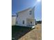 Exterior elevation of a two-story home with a covered patio at 184 Bruce Dr, Dunn, NC 28334