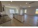 Spacious kitchen with granite countertops, a large island, and stainless steel appliances at 184 Bruce Dr, Dunn, NC 28334