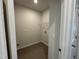 Laundry room with tile flooring and wire shelving at 184 Bruce Dr, Dunn, NC 28334