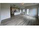 Spacious open-concept living area flowing into the kitchen and eating area at 184 Bruce Dr, Dunn, NC 28334