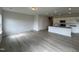 View of the open-concept living area with a kitchen featuring a large island and stainless appliances at 184 Bruce Dr, Dunn, NC 28334