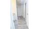 Bathroom featuring wood-look tile floors, a shower with a glass door, granite countertops and a toilet at 2121 Wildwind Dr, Graham, NC 27253