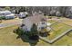 A large well-maintained yard with a deck and fencing, providing an ideal space for outdoor enjoyment at 22 Old York Cir, Clayton, NC 27527
