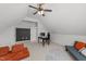Cozy bonus room with ceiling fan, and decor for a relaxing and productive atmosphere at 22 Old York Cir, Clayton, NC 27527