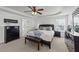 Beautifully decorated bedroom with a dark wood bed frame, neutral walls and carpeting at 22 Old York Cir, Clayton, NC 27527