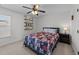 Bedroom with neutral walls and a decorative shelf with decor at 22 Old York Cir, Clayton, NC 27527