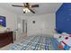 Bedroom with blue accent wall and fun decor at 22 Old York Cir, Clayton, NC 27527