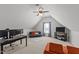 Bonus room with tv, sofa, and desk at 22 Old York Cir, Clayton, NC 27527