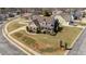 Charming two-story home with a well-manicured lawn, front porch, and neatly landscaped yard at 22 Old York Cir, Clayton, NC 27527