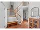 Spacious foyer with hardwood floors, a staircase with white railings, and ample natural light at 22 Old York Cir, Clayton, NC 27527
