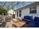 View of an inviting back deck with outdoor furniture perfect for entertaining and enjoying the outdoors at 224 Round About Rd, Holly Springs, NC 27540