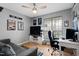 Multi-purpose bedroom or office with hardwood floors, natural light, and comfortable decor at 224 Round About Rd, Holly Springs, NC 27540