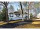 Charming single-story home with a welcoming front porch and landscaped front yard, showcasing curb appeal at 224 Round About Rd, Holly Springs, NC 27540