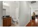 Bathroom features a vanity with granite counters and a shower with a white curtain at 241 Lifeson Way, Cary, NC 27519