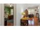 View from a hallway looking into a bedroom and dining area at 241 Lifeson Way, Cary, NC 27519