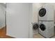 Laundry closet with stacked washer and dryer at 241 Lifeson Way, Cary, NC 27519