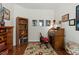 Comfortable office space with wood floors and a cozy chair at 241 Lifeson Way, Cary, NC 27519