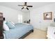 Bedroom with neutral walls, carpet flooring and ceiling fan at 2436 Fiddich Ln, Fuquay Varina, NC 27526