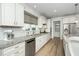 Well-equipped kitchen with stainless steel appliances, modern backsplash, and ample counter space at 2436 Fiddich Ln, Fuquay Varina, NC 27526