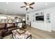 Open floor plan showing the living room with modern decor and open to the kitchen at 2436 Fiddich Ln, Fuquay Varina, NC 27526