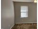 Relaxing bedroom with neutral-toned walls, plush carpeting, and natural light streaming in at 319 Davis Rd, Hillsborough, NC 27278
