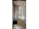 Inviting entryway with neutral walls, tile flooring, and an open view into the living spaces at 319 Davis Rd, Hillsborough, NC 27278