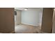 Comfortable living room with plush carpeting and natural light pouring in at 319 Davis Rd, Hillsborough, NC 27278